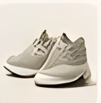 Grey knit running shoes